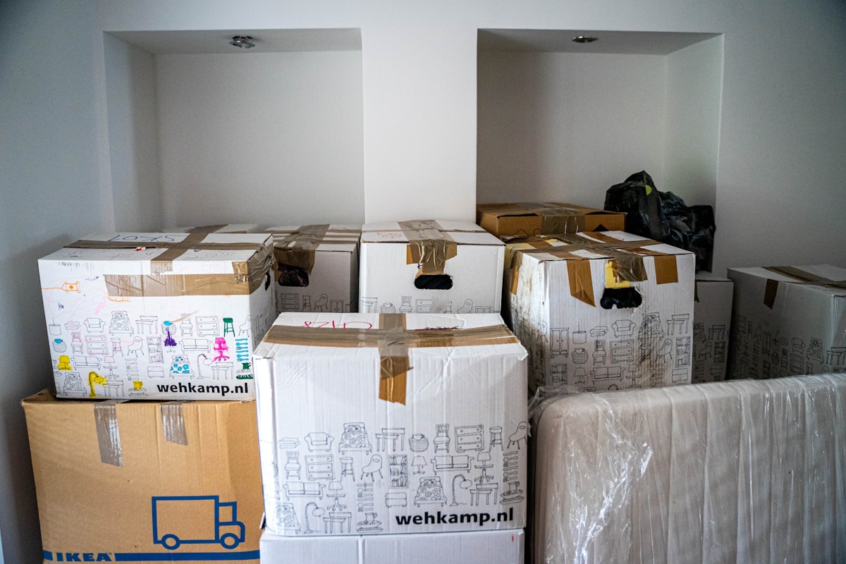 Brown cardboard boxes stacked ready for moving home