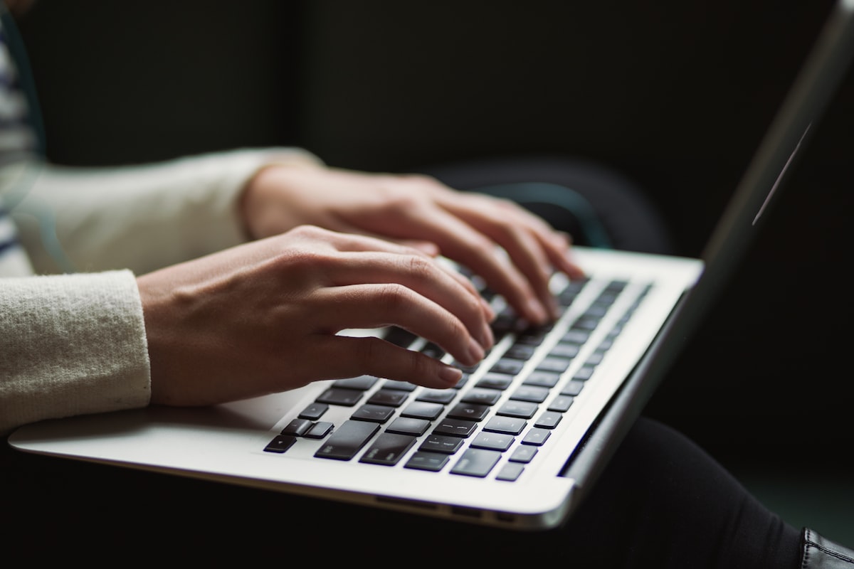 Person working on a laptop computer