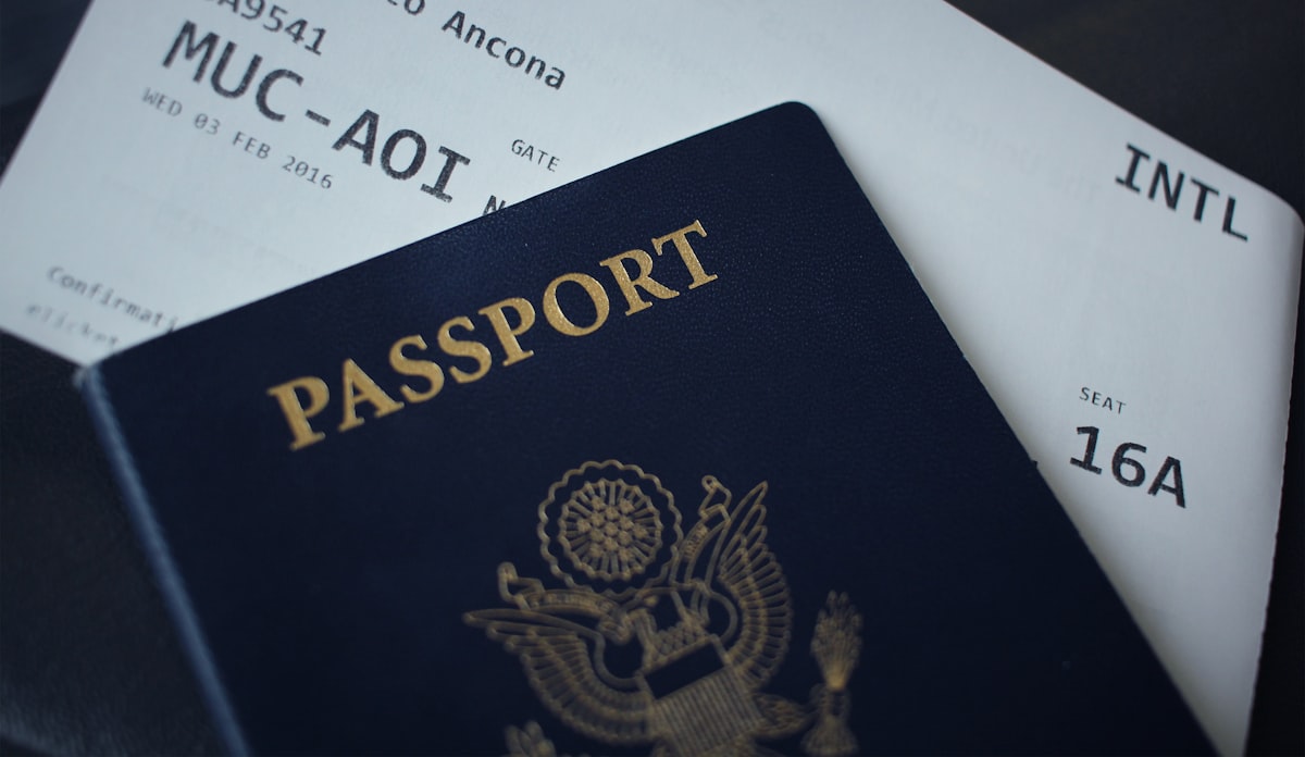 Passport booklet on a white surface, ready for travel