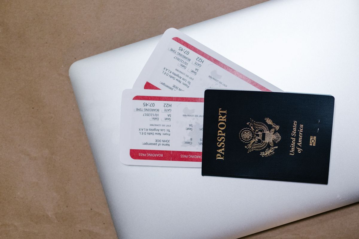 UK passport and travel tickets, representing passport renewal for travel abroad